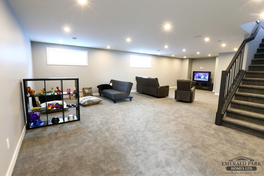 32 Churchill Cres show home emerald park homes basement layout open concept family room play