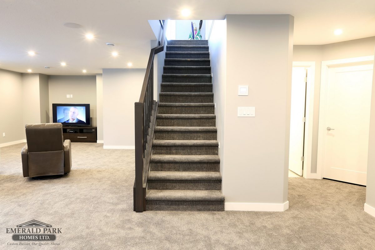 Emerald Park Homes The Churchill 1610sqft bungalow home 3 beds 2 baths carpet staircase with